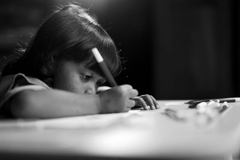 A child writing on a paper

AI-generated content may be incorrect.